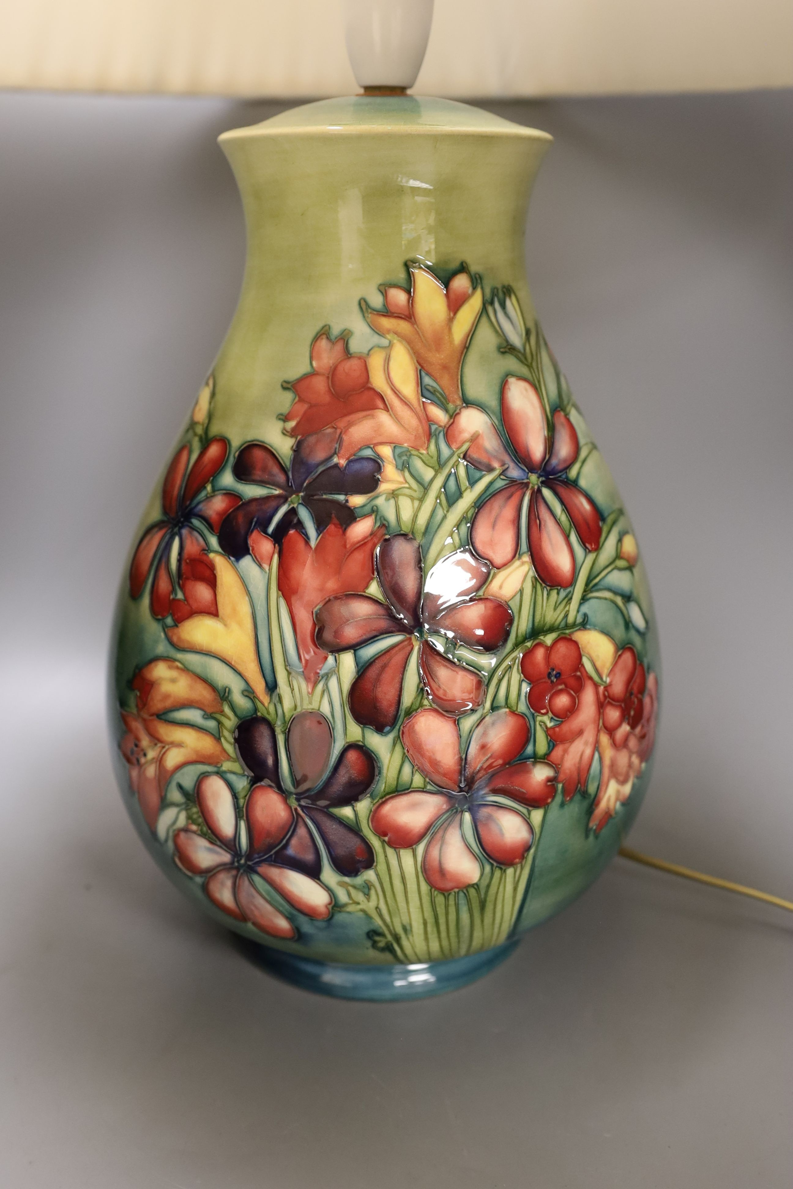 A large Moorcroft Spring Flowers table lamp base, 35 cms high.